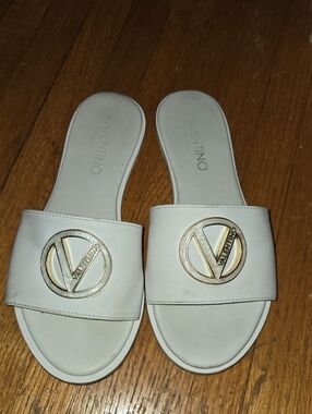 Valentino White Slide Mules with Gold Emblem